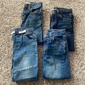 FOUR pairs of jeans